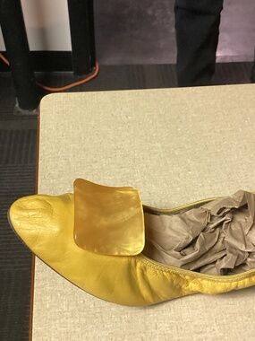 Yellow fold over slippers an old Hollywood glamour. Yellow 7-7/1/2